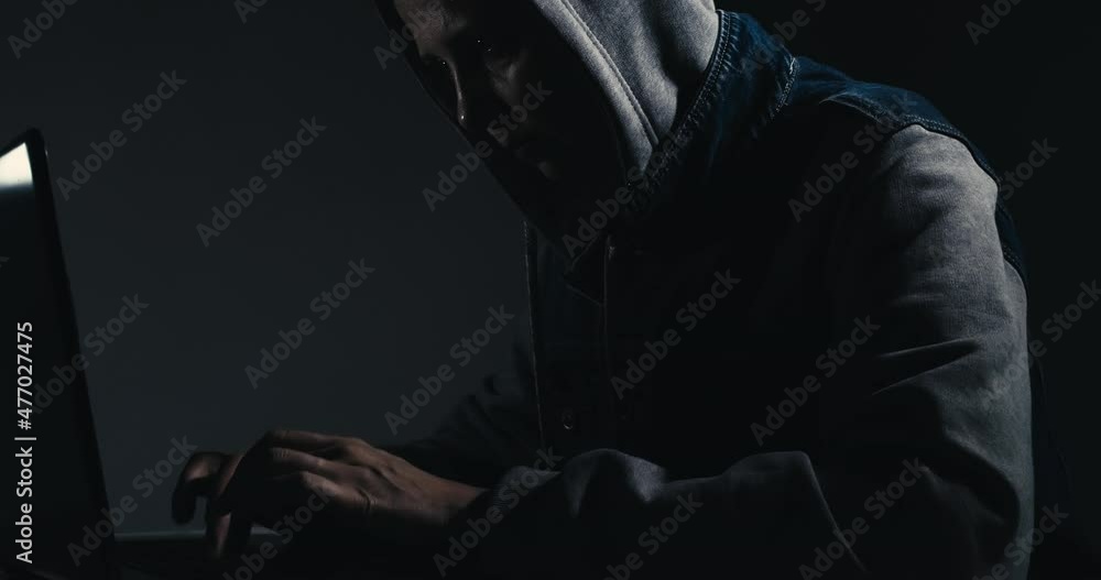 a professional female hacker uses a keyboard to enter incorrect data into an online computer system and spreads stolen personal information around the world. a professional female hacker uses a keyboard to enter incorrect data into an online computer system and spreads stolen personal information around the world.