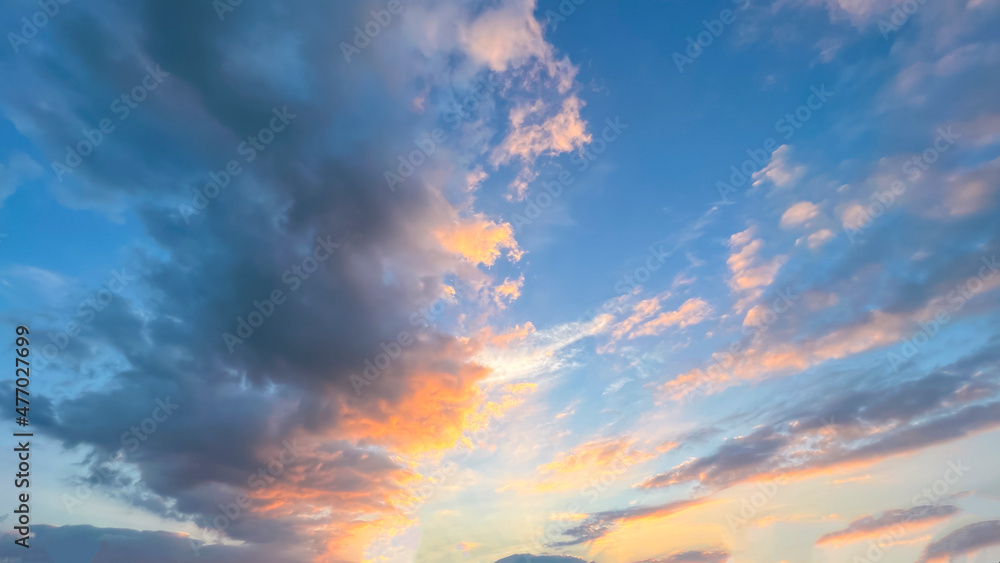 Colorful cloudy sky at sunset, beautiful nature background