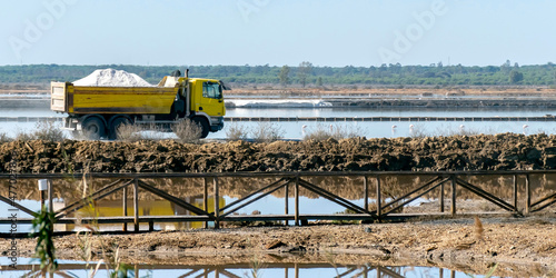 A loaded truck transfers the collected sea salt to its destination
