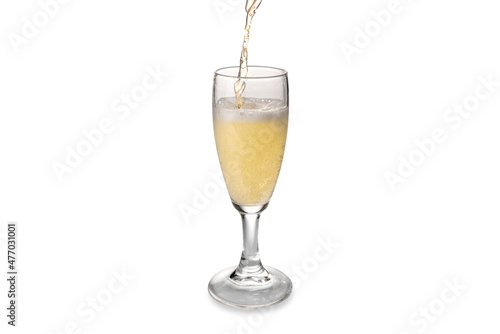 Champagne or sparkling wine pour into glass with splashing  isolated on white, copy space