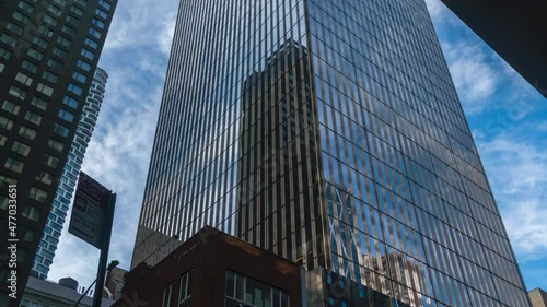 Time Lapse of Clouds Reflected on Large Manhattan Skyscrapers