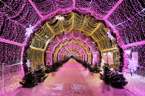 New year and Xmas street decoration in night illuminated Moscow, LED light tunnel