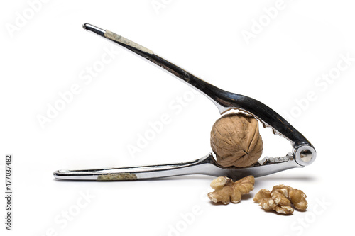 pliers open nuts walnut nutcracker white background