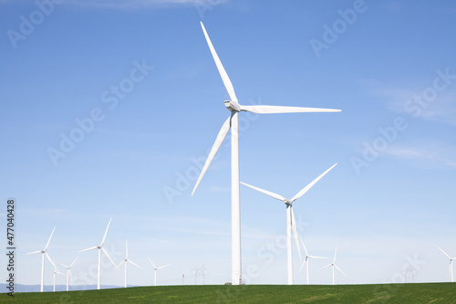 Wind turbines with blue sky © Jon