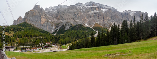 Summer ski resort. Dolomites in European Alps. Shot in summer with green grass and no snow