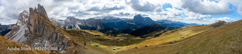 Hiking Dolomites in European Alps. Shot in summer with green grass and no snow. Gardena Pass  Italy