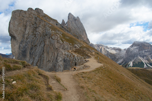 Hiking Dolomites in European Alps. Shot in summer with green grass and no snow. Gardena Pass, Italy