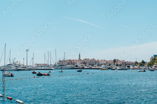 View of old town Budva with yachts and boats, Montenegro. The resort city located in Budva Riviera of Adriatic Sea. High quality photo for poster, branding, calendar, multicolor card, banner, cover