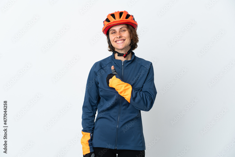 Young English cyclist woman isolated on white background giving a thumbs up gesture Young English cyclist woman isolated on white background giving a thumbs up gesture