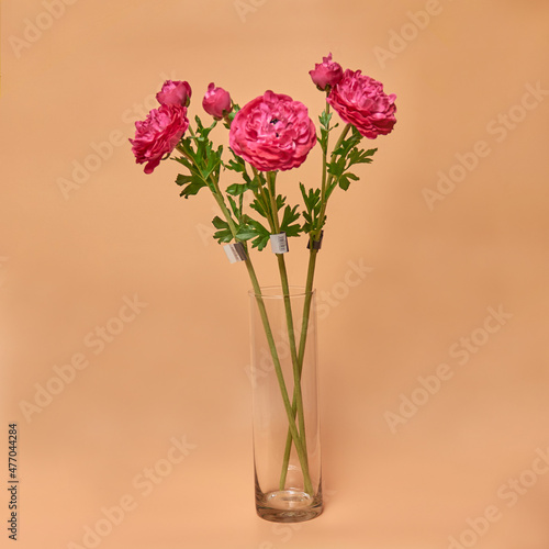Decorative ceramic vase. Beautiful floral arrangement of af artificial plant in flower pot. Stylish Interior composition in home design