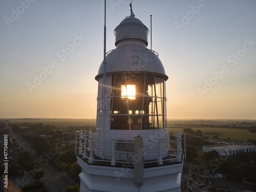 Winter sunset through the windows at the top of the 127 feet high Lighthouse in Withernsea, East Yorkshire, UK  photo