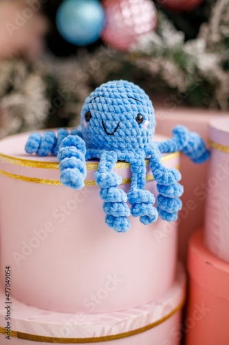 Knitted toy for decorating the Christmas tree.