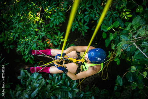 Climbing a rope to a jungle treehouse, Manzanillo, Costa Rica