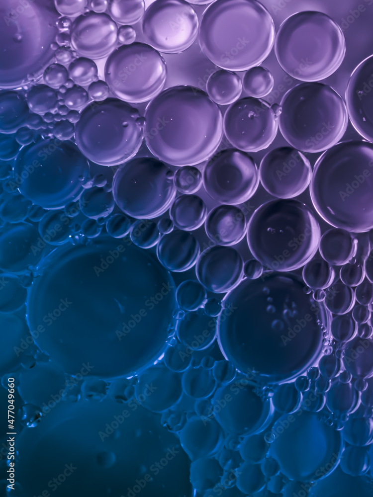 Close-up of oil bubbles in water