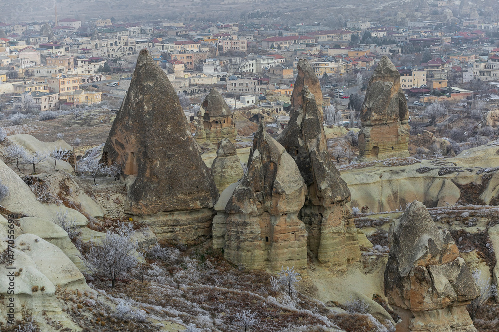 Volcanic rock landcsape of Fairy tale chimneys in Cappadocia with blue sky on background 