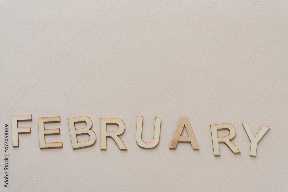 background with the word february on paper background with the word february on paper