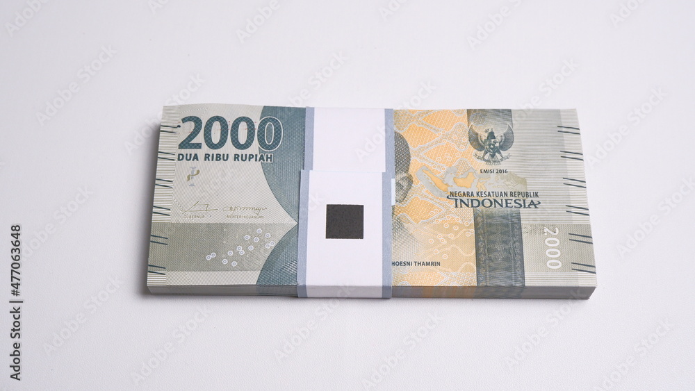 Indonesian Rupiah the official currency of Indonesia. Business and finance concept, Uang 2000 Rupiah, Bank Indonesia Indonesian Rupiah the official currency of Indonesia. Business and finance concept, Uang 2000 Rupiah, Bank Indonesia