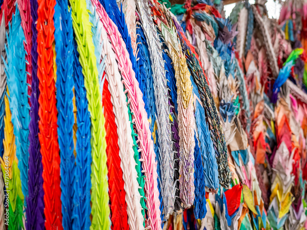 a lot of colorful paper cranes hanged and displayed in shito shrine in tokyo a lot of colorful paper cranes hanged and displayed in shito shrine in tokyo
