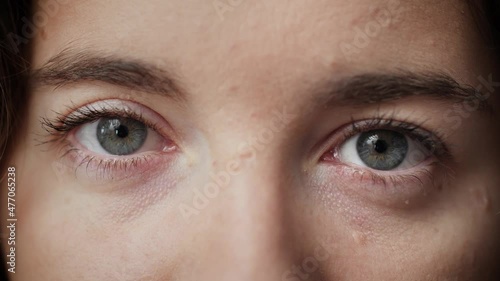 Collage of close-up of eyes and faces of women of different ages and races. Montage of female people looking and smiling at camera. Concept of feminism, woman empowerment, gender equality.
