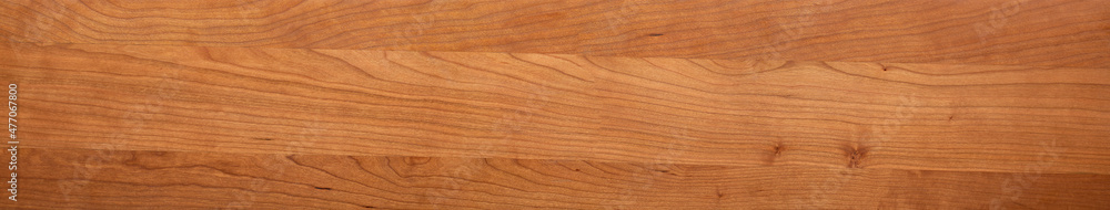 Long and wide wooden texture panoramic background. Solid wood splicing long tabletop, cherry wood long board texture background. Long and wide wooden texture panoramic background. Solid wood splicing long tabletop, cherry wood long board texture background.