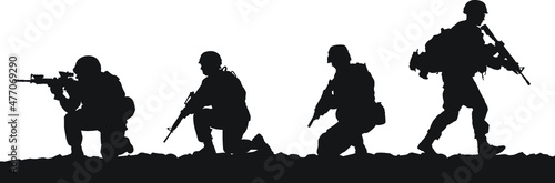 Fotografie, Obraz Vector silhouettes of American soldiers in combat positions.