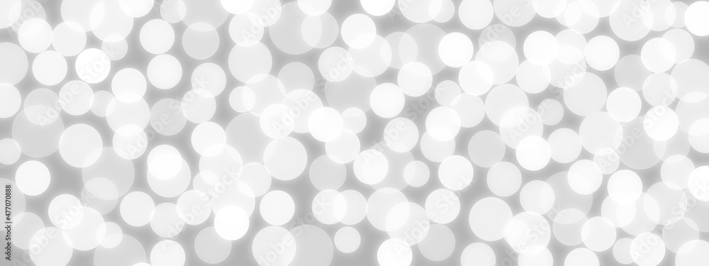 White bokeh on grey background White bokeh on grey background