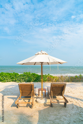 umbrella with beach chair and ocean sea background