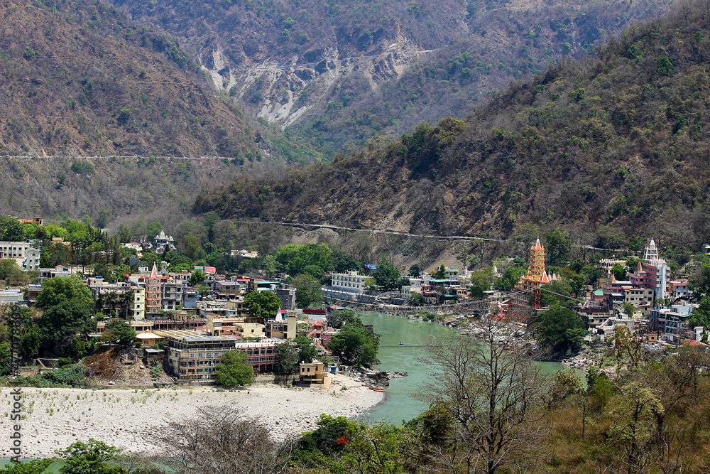 Naklejka premium top view of the city Rishikesh . Holy Ganges River