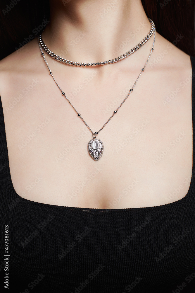 Beautiful young woman with elegant necklace Beautiful young woman with elegant necklace