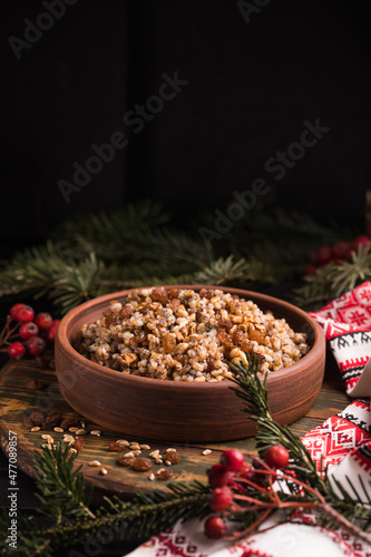 Kutya. Traditional Christmas slavic dish kutia porridge made of wheat grains, poppy seed, nuts, raisins and honey. Eastern Orthodox Christians in Ukraine, Belarus and Russia. photo