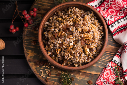Kutya. Traditional Christmas slavic dish kutia porridge made of wheat grains, poppy seed, nuts, raisins and honey. Eastern Orthodox Christians in Ukraine, Belarus and Russia. photo
