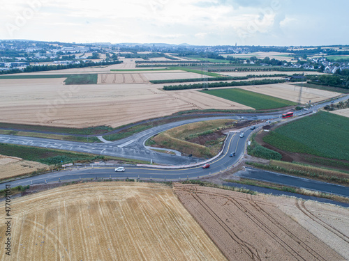Aerial photograph of road cross under construction. building new streeet area connection Viewpoint from above photo