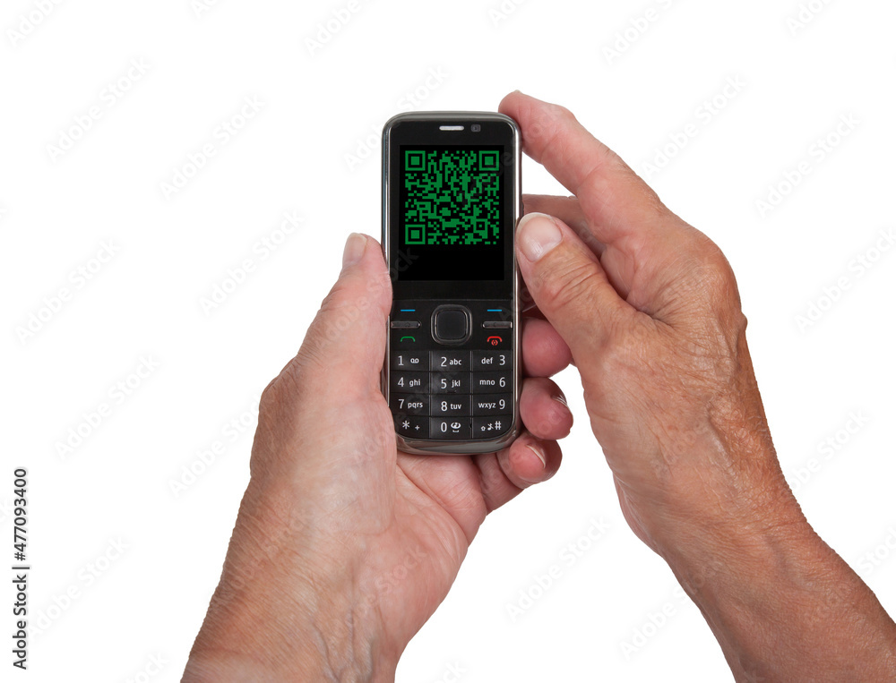 Hands of senior womanwith a mobile phone - QR-code Hands of senior womanwith a mobile phone - QR-code