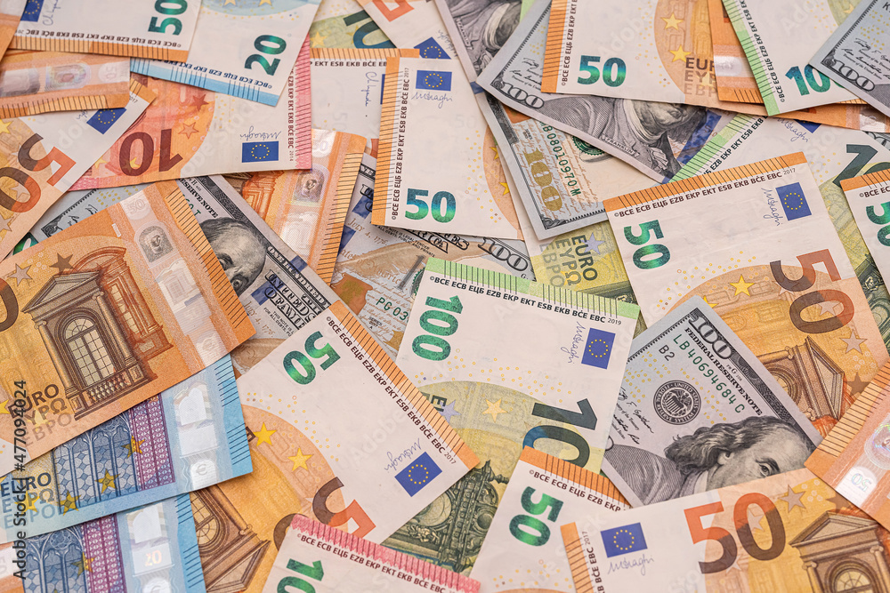 different euro and dollar banknotes, finance background different euro and dollar banknotes, finance background
