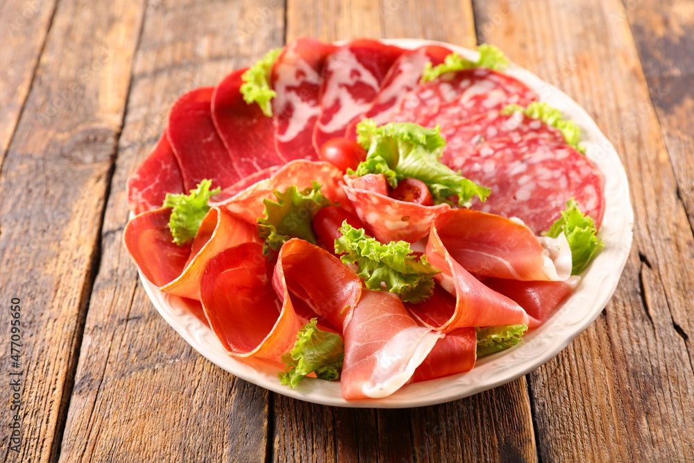 plate of salami and bacon plate of salami and bacon