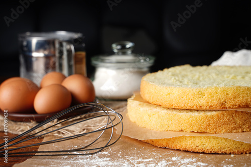 Sponge Cake Layers, Sponge cake, shortcakes on baking grid, text space, selective focus, close up.