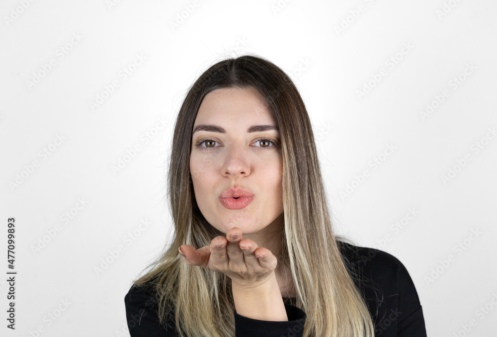 Close up photo of blonde cute charming lady fellows fellowship send air kiss. White background. Close up photo of blonde cute charming lady fellows fellowship send air kiss. White background.