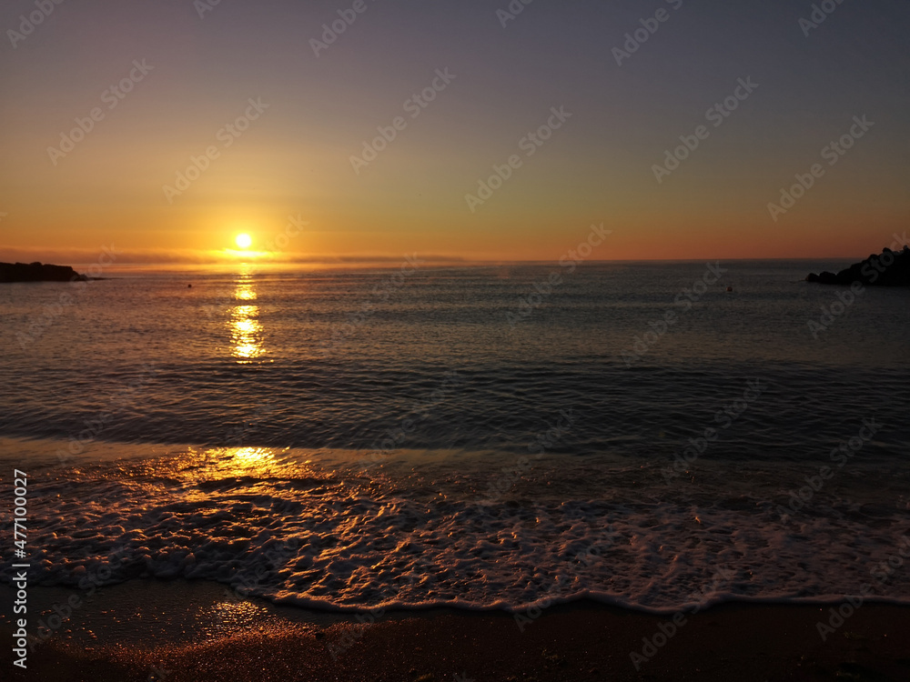 Mistic sunset at Black Sea shore, orange sky, magical water Mistic sunset at Black Sea shore, orange sky, magical water