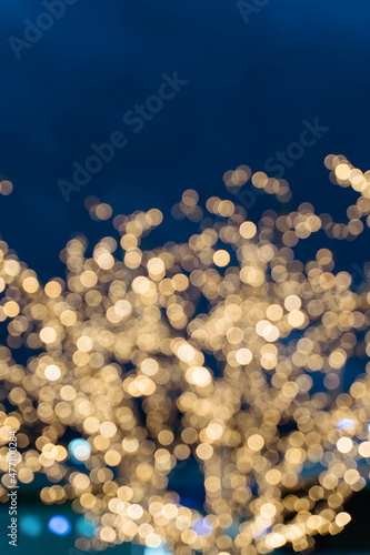 golden christmas lights on blue background