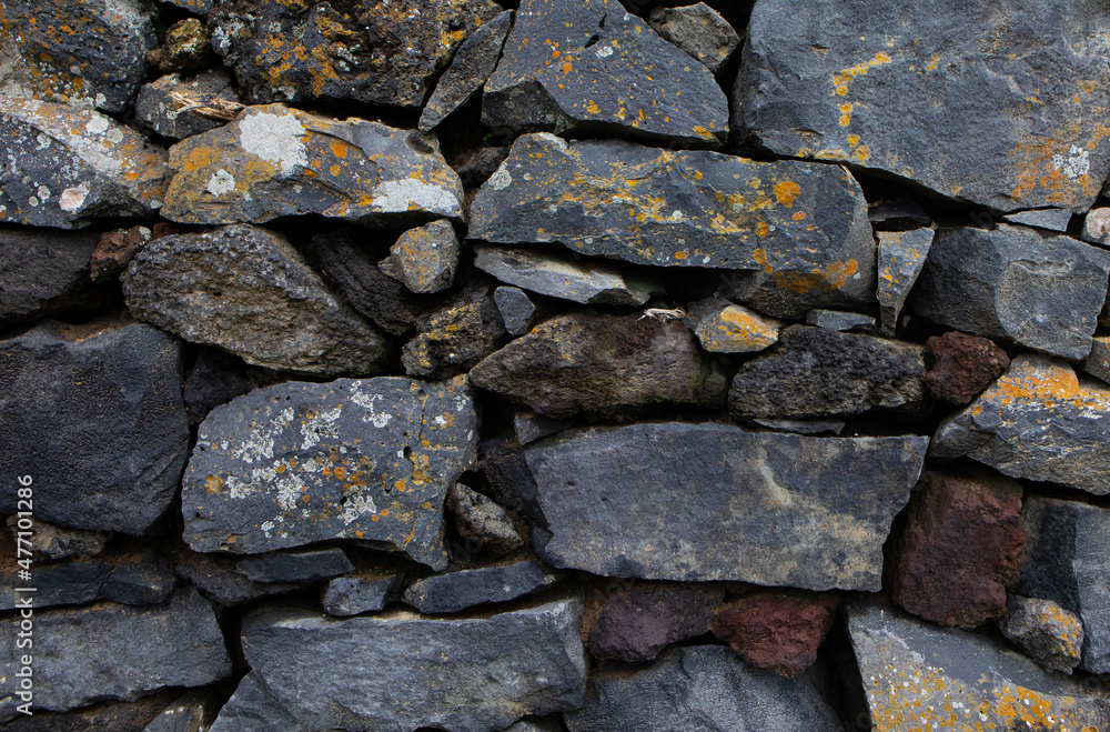 Volcanic rocks stack making stone wall
