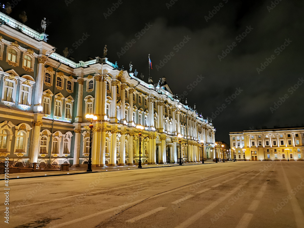The Winter Palace on the Palace Square of St. Petersburg in an early winter morning against the background of a black sky.