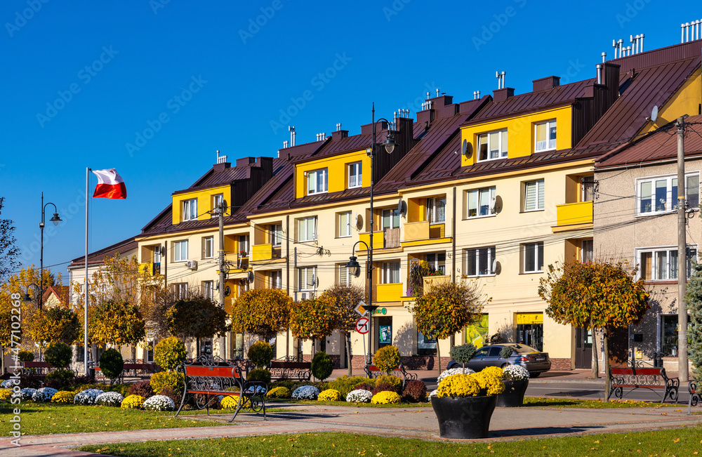 Fototapeta premium Historic town tenement houses at Rynek Market Square in old town quarter of Sedziszow Malopolski town in Podkarpacie region of Lesser Poland