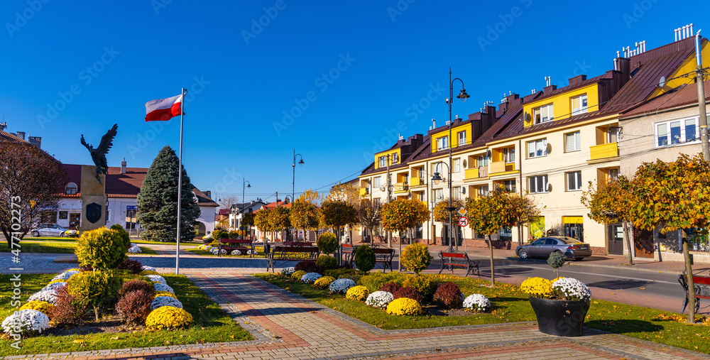 Fototapeta premium Historic town tenement houses at Rynek Market Square in old town quarter of Sedziszow Malopolski town in Podkarpacie region of Lesser Poland