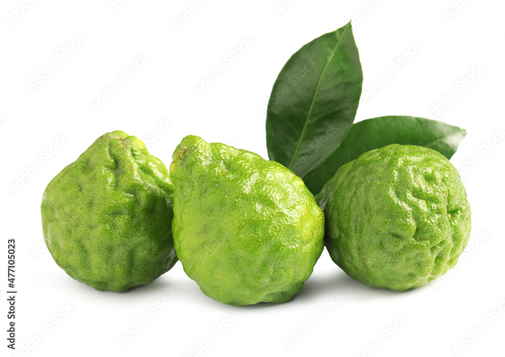 Fresh ripe bergamot fruits and leaves on white background Fresh ripe bergamot fruits and leaves on white background