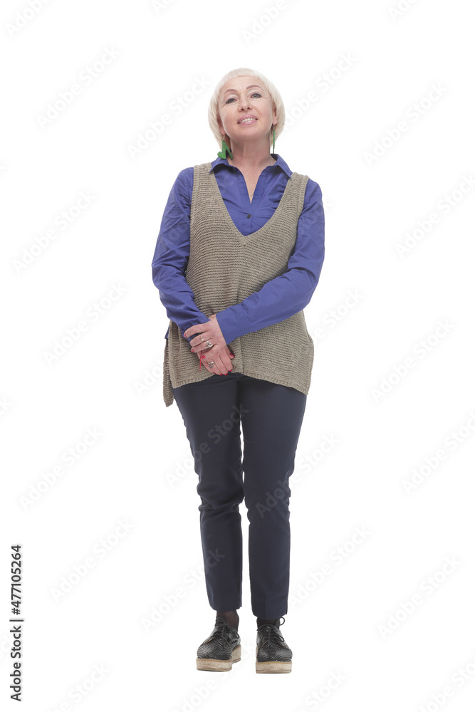 in full growth. attractive Mature woman in a gray vest. in full growth. attractive Mature woman in a gray vest.