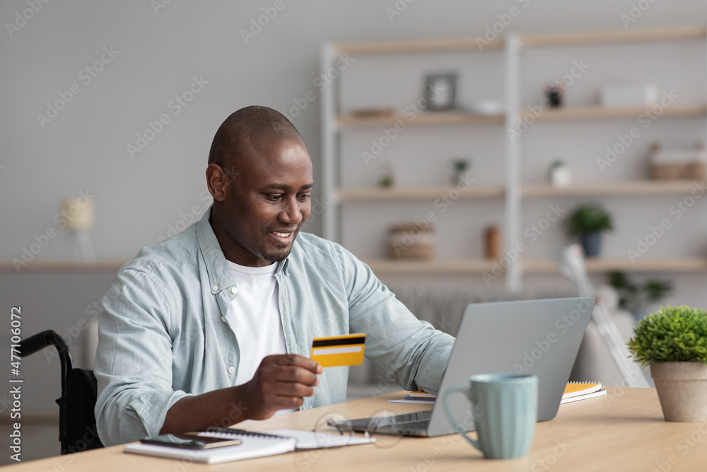 Person with disabilities, shopaholic, online purchases and payment service at home Person with disabilities, shopaholic, online purchases and payment service at home