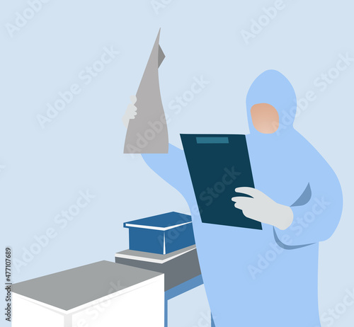 A doctor in a protective suit with a tablet for notes.