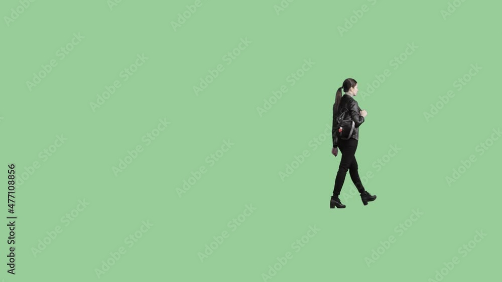 A shapely girl in black walks on a transparent background. Perspective view A shapely girl in black walks on a transparent background. Perspective view