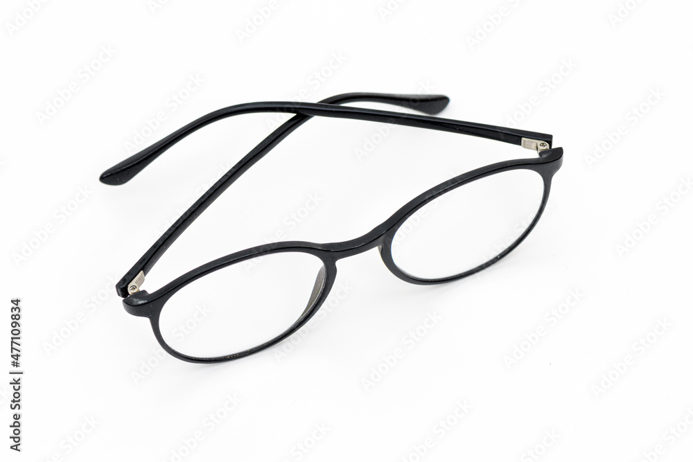 Stylish modern fashionable eyeglasses on the gray background. Stylish modern fashionable eyeglasses on the gray background.