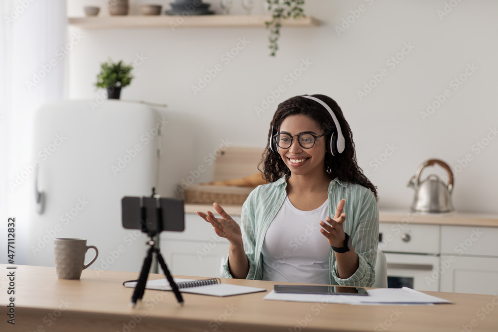 Businesswoman teacher lecturer recording educational video, greeting students at online lesson Businesswoman teacher lecturer recording educational video, greeting students at online lesson